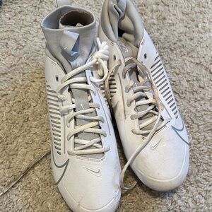 Nike White and Light Gray Athletic Cleats with Swoosh Accents